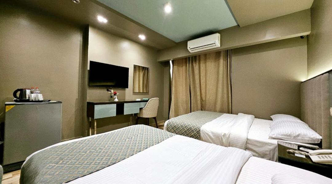 Grand Bayan Hotel & Apt At Nile Plaza Κάιρο Δωμάτιο φωτογραφία