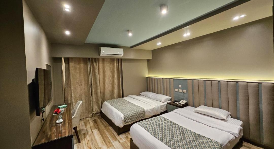 Grand Bayan Hotel & Apt At Nile Plaza Κάιρο Δωμάτιο φωτογραφία