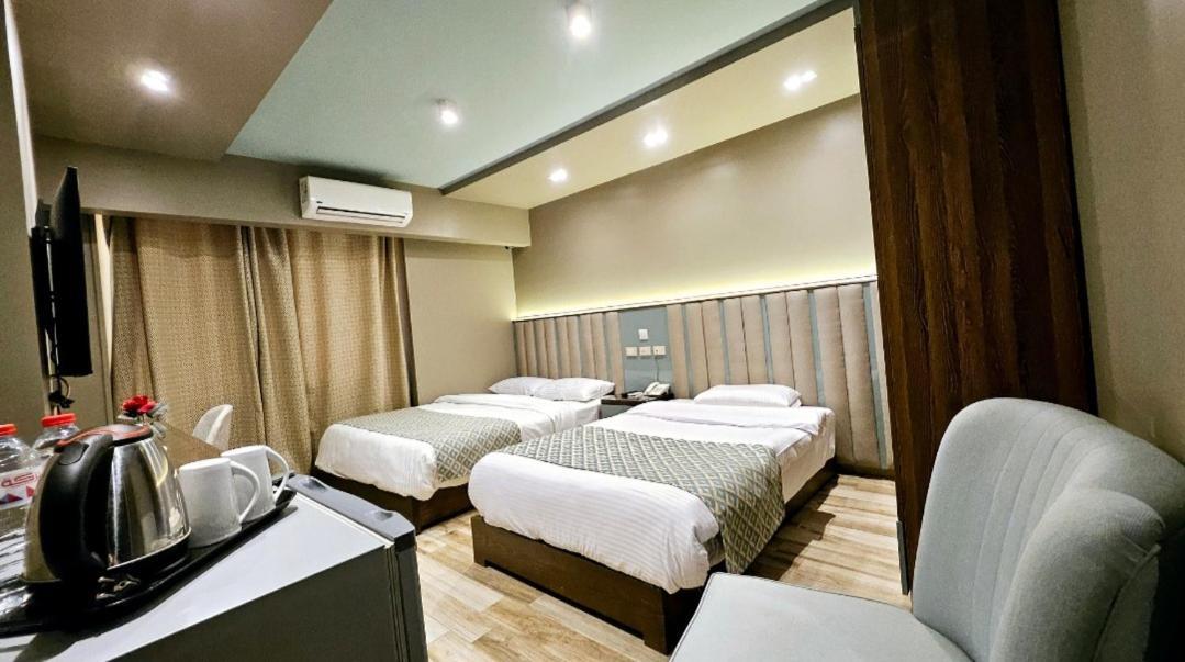 Grand Bayan Hotel & Apt At Nile Plaza Κάιρο Δωμάτιο φωτογραφία