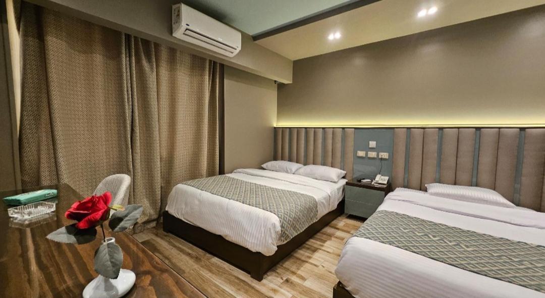 Grand Bayan Hotel & Apt At Nile Plaza Κάιρο Δωμάτιο φωτογραφία