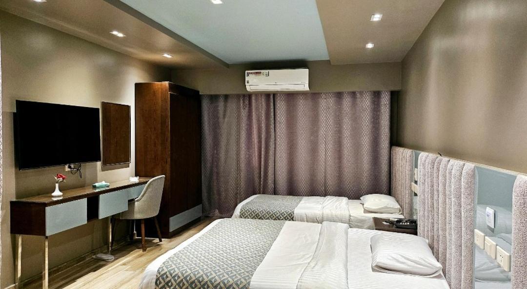Grand Bayan Hotel & Apt At Nile Plaza Κάιρο Δωμάτιο φωτογραφία